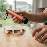 Blackout Water Survival Straw - Hands using product