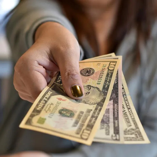 Holding emergency cash — the cost of being prepared